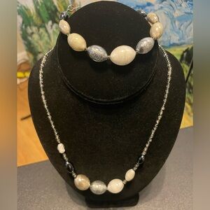 Handmade costume jewelry in white, grey and black glass beads